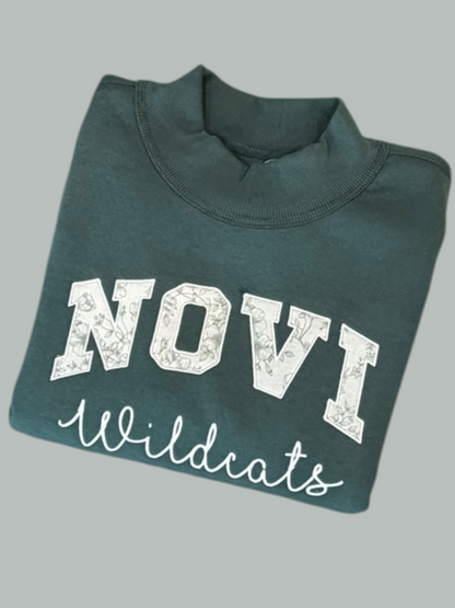 NOVI green and ivory floral applique mockneck